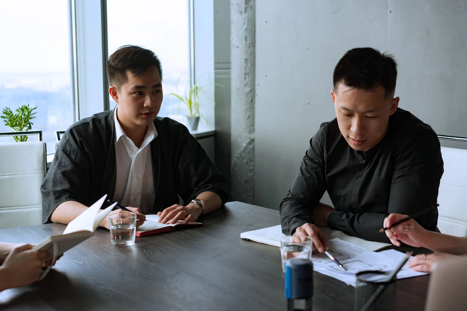 Team reviewing business strategy together in a meeting room